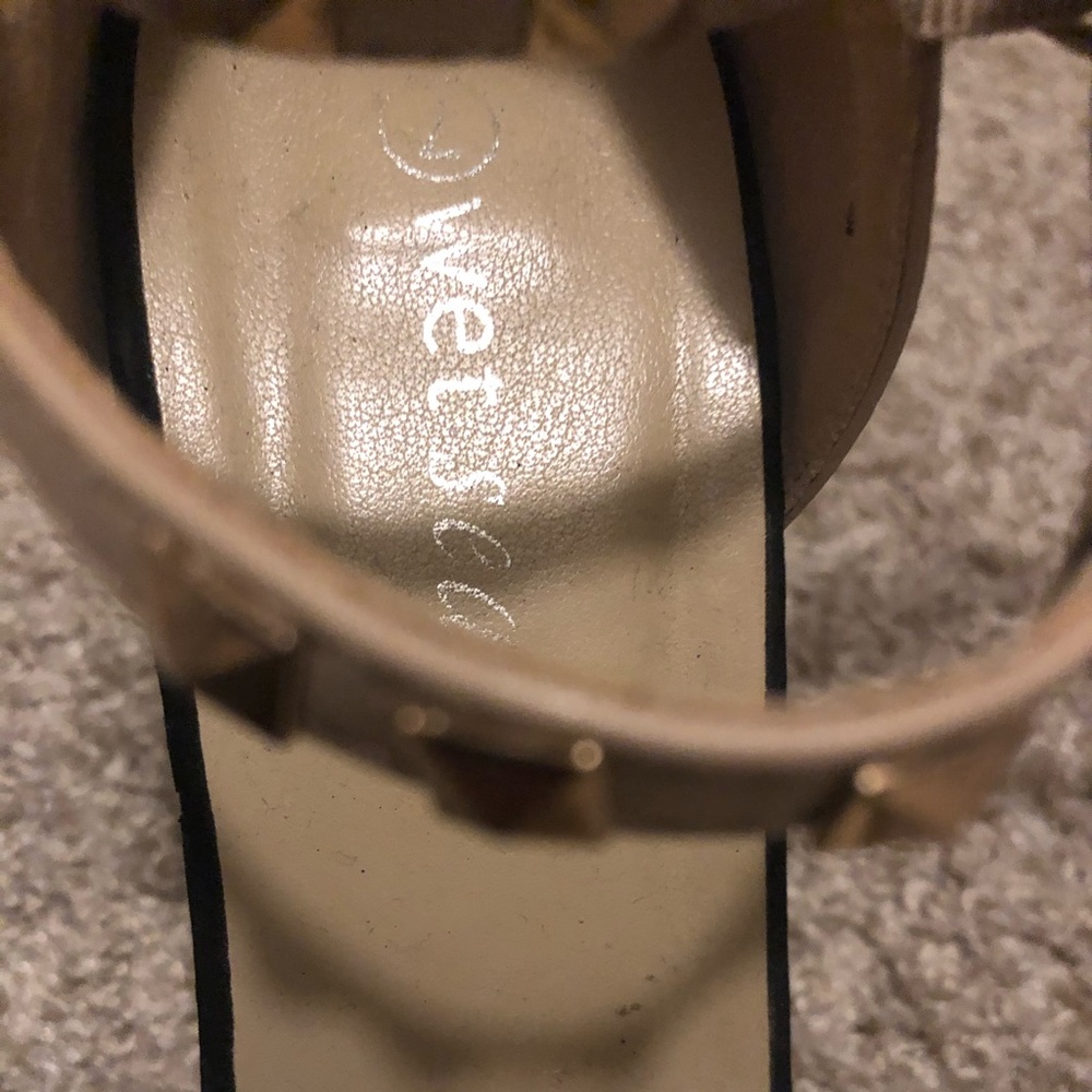 Brown boots with 3-4 inch heel.